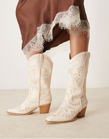 ‌Stylish embroidered western knee boots in cream