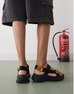 CAT Progressor web bold chunky sandals in black womens