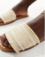 Nalani fringe flat sandals in gold