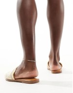 Nalani fringe flat sandals in gold
